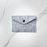 Pochettes en feutre faites à la main avec jade blanc naturel pour massage Gua Sha - Cadeau promotionnel