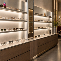 Présentoir à lunettes Sundo au design moderne, vitrine en bois pour lunettes, mobilier de magasin d'optique personnalisé à vendre