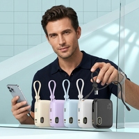 Batterie externe 10000 mAh à charge rapide bidirectionnelle 22,5 W avec câbles détachables mini pour les voyages d'affaires et l'usage quotidien – Vente directe usine