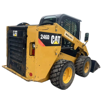 Mini-chargeuse compacte sur pneus d'occasion CAT246D, CAT246C, charge nominale 975 kg, godet 0,6 m³, moteur CAT C3.3B, garantie 1 an