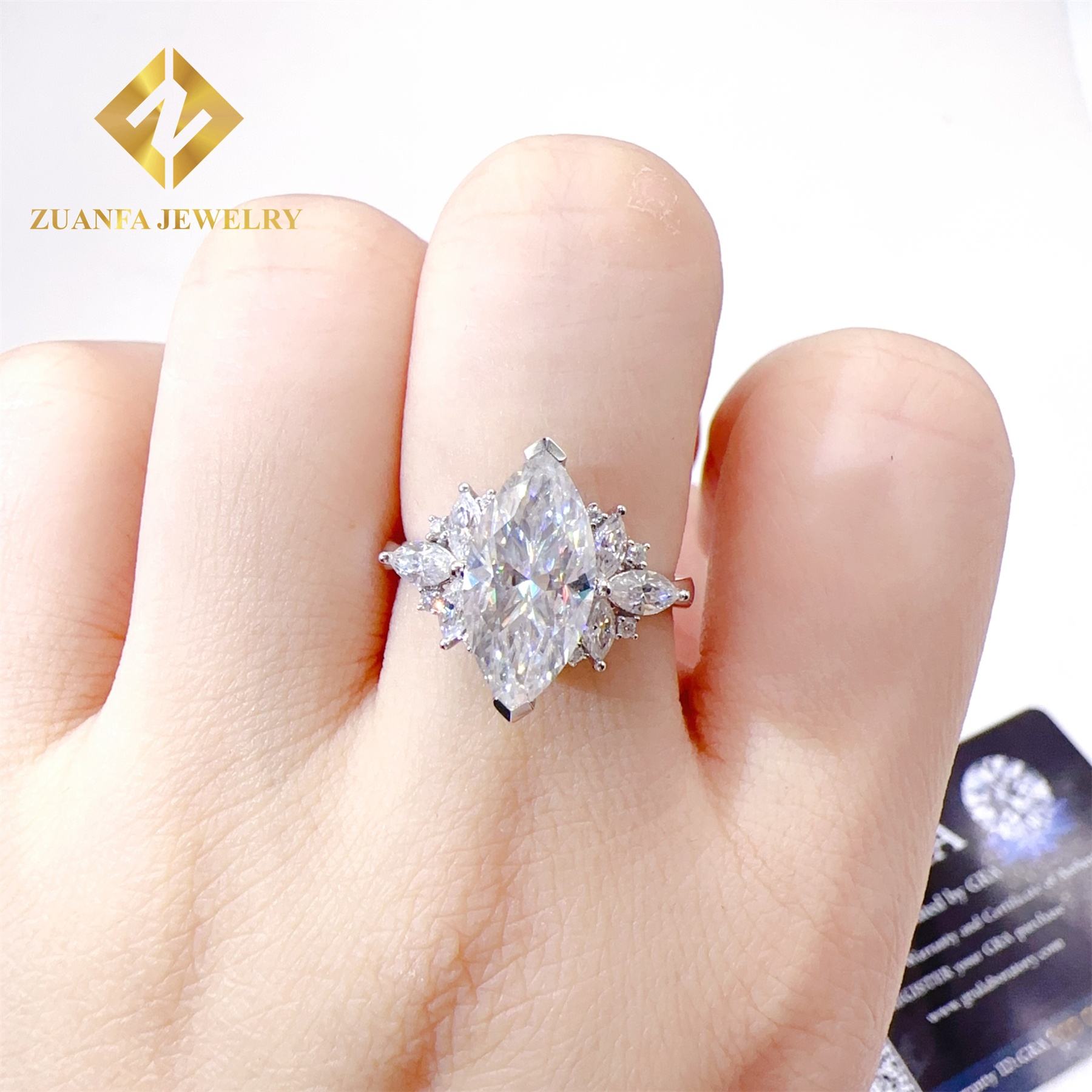 18k white gold with 3ct marquise moissanite