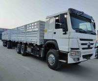 Prix du camion Sinotruck Howo 6X4, camion lourd de 400 ch, camion de transport de marchandises à plateau, camion de transport de marchandises