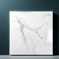 Matériaux de construction importés : Carreaux de grès porcelané gris Kajaria 600*600, aspect marbre poli moderne, pour murs et sols intérieurs de villas.