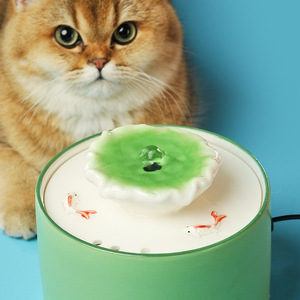 Fontaine à eau pour chat de style feuille de lotus, en céramique, à circulation automatique, chauffante, à température constante, pour animaux de compagnie, à poser sur le bureau - Product Image 2