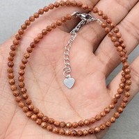 Collier ras du cou en pierre de grès dorée, micro-pavé de pierres précieuses, bijoux délicats et tendance pour soirée, style minimaliste