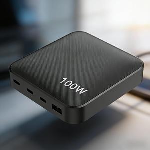 Estación de carga multifunción para escritorio, máxima potencia para 4 dispositivos simultáneamente con carga rápida USB C de 100W para portátil, tableta y teléfono. - Product Image 1