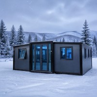 Maison préfabriquée modulaire extensible en conteneur, structure en acier, murs en panneaux sandwich, ignifuge, imperméable, résistant au vent, isolée.