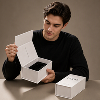 Boîte cadeau rigide magnétique blanche de luxe avec logo personnalisé et insert en EVA pour l'emballage de parfums et de bijoux