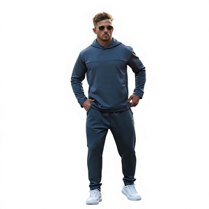 Ensemble de survêtement pour homme bleu foncé à capuche, manches longues, couleur unie, décontracté, taille élastique, poches latérales, 100% polyester, vêtements d'automne - Product Image 1