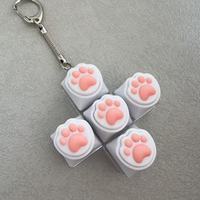 En gros, Porte-clés anti-stress en silicone Patte de chat, jouet à presser pour clavier mécanique, mignon et moelleux, breloque anti-stress pour usage quotidien