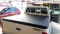 La meilleure couverture souple à trois plis pour pick-up Toyota Hilux Revo double cabine 2015+ Vente chaude Protection imperméable en PVC pour le coffre arrière