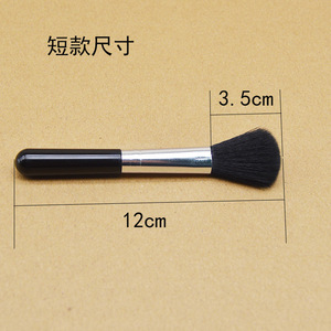 Brocha de maquillaje negra de 3.5 cm con fibras sintéticas y mango de plástico para bronceadores e iluminadores - Product Image 2