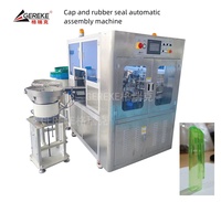 Machine d'assemblage automatique intelligente pour capuchons et joints en caoutchouc, double sortie