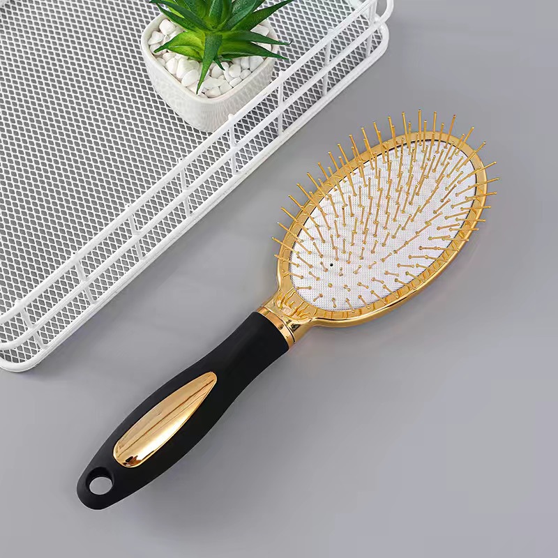 #5 Brosse à cheveux électrique