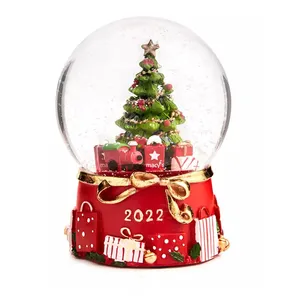 Natale personalizzato personalizzato resina musicale Glitterdome 100mm Snow Globe per le vendite