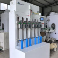 Machine de remplissage semi-automatique à 4 têtes pour liquides dégraissants, détergents et produits corrosifs, format 1 gallon (1L)