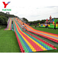 Toboggan arc-en-ciel personnalisé aire de jeux extérieure pour enfants manèges équipement d'amusement en plein air toboggan en plastique de neige sèche arc-en-ciel