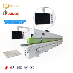 Machine de chantournage de panneaux en bois et en aluminium à haute productivité JUNDE 30KW pour la fabrication de portes et de meubles - Product Image 1