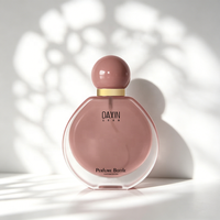 Flacon de parfum rond élégant pour femme avec bouchon sphérique, couleur et logo personnalisés, contenant de parfum classique pour femme, vente en gros
