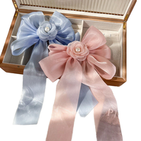 Pince à cheveux en forme de fleur brillante en mousseline avec long ruban pour femmes et filles, accessoire de coiffure pour fêtes et usage quotidien