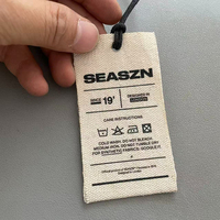 Étiquette personnalisée en toile de coton naturel épaisse avec logo et nom, à faible MOQ, avec cordon et œillet métallique, pour vêtements