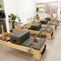 Reformer Pilates professionnel ProReach en bois d'érable avec tour, design écologique et durable, lit de luxe pour usage domestique - Prix usine