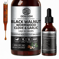 Complément alimentaire liquide GMP OEM sous marque privée : Gouttes de noix noires, armoise, clou de girofle et ail pour la santé digestive et l'équilibre intestinal
