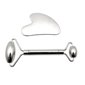 Échantillon <span class=keywords><strong>gratuit</strong></span> ensemble de masseurs faciaux anti-âge en acier inoxydable rouleau de jade outils de grattage pour le coeur pour l'application du visage - Product Image 1
