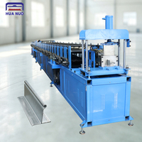 Machine de formage à froid pour rail inférieur de porte à enroulement en acier avec certification CE pour systèmes de volets roulants au Nigeria, service OEM