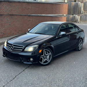 Mercedes C-Klasse W204 Schwarze Limousine mit AMG-Style 5-Speichen-Rädern ABDULLAH ENTERPRISES # 76 Colorado Origin Auf Lager - Product Image 1