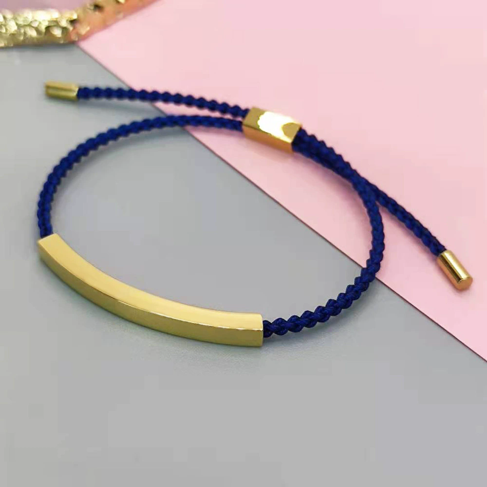 Plaque incurvée dorée + ficelle bleue