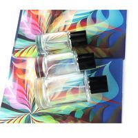 Vente en gros bouteille de parfum de luxe vide de haute qualité transparente OEM de 50 ml en verre avec boîte cadeau pulvérisateur à pompe