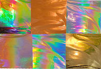Feuille d'emballage holographique argentée de 980mm de largeur pour cigarette arc-en-ciel PET personnalisée en plastique générique à chaud 1 rouleau