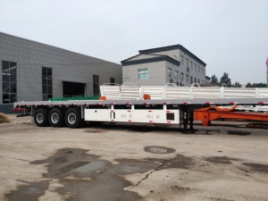 Semirremolque de Plataforma Plana de Acero Haoyue con Bloqueo Giratorio, Eje Doble, 60 Toneladas, Bajo, para Transporte de Contenedores - Product Image 3