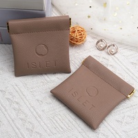 Nouvelle petite pochette à bijoux en cuir PU avec logo personnalisé d'usine trousse de toilette ouverte trousse de maquillage cosmétique de voyage