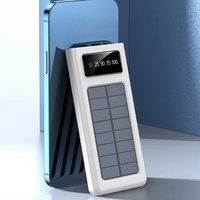 Vente en gros ultra-mince 10000 Mah banque de charge solaire quatre fils portable 10W sortie alimentation mobile avec micro USB transfrontalière