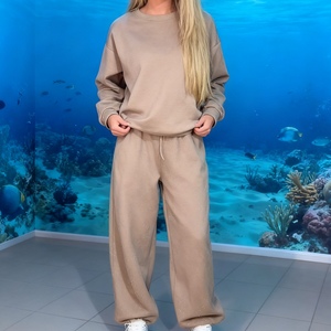 ชุดเซ็ต 2 ชิ้น แฟชั่นสำหรับผู้หญิง ฤดูใบไม้ร่วง/ฤดูหนาว คอกลม แขนยาว ประดับเพชรทั้งตัว ชายเสื้อปรับได้ด้วยเชือกผูก - Product Image 1