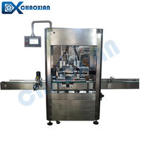 Machine de remplissage automatique à double tête servo pour produits visqueux (soins de la peau, shampoings, crèmes) avec suivi de la bouteille