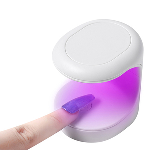 Venta al por mayor de mini secador de uñas de inteligencia portátil personalizado con lámpara LED UV máquinas de salón para tinte de uñas UV portátil - Product Image 1