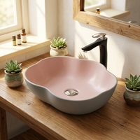 Lavabo de cerámica montado sobre encimera personalizado de fábrica recién llegado con forma creativa lavabo de arte hecho a mano para Baño