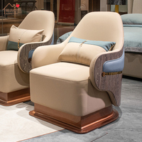 Fauteuil lounge en cuir italien moderne de luxe avec structure en bois massif, design écologique et imperméable pour salon, chambre et hôtels
