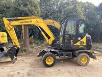 Vente flash : Excavatrice Hyundai R60W-7 d'occasion, 6 tonnes, moteur et pompe Hyundai d'origine, sur roues, Corée