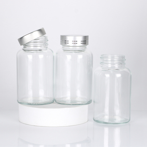 Vente en gros de flacons en verre personnalisés, emballage pharmaceutique en verre transparent pour produits de santé avec bouchon à vis - Product Image 1