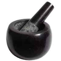 Mortier et pilon en pierre naturelle noire pour herbes et épices