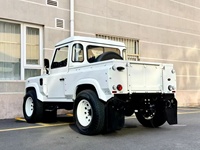 Kit carrosserie large pour Land Rover Defender 110/90 : pare-chocs avant et arrière, ailes, calandre avant, déflecteurs d'air et extensions d'ailes