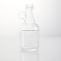 Bouteille en verre miniature de 50 ml de haute qualité avec poignée, bouteille à liqueur avec bouchon à vis, bouteille en verre pour sirop d'érable avec boucle de maintien