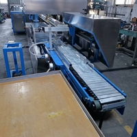 Machine à découper le verre capable de couper des tubes en verre d'un diamètre de 25 à 120 mm, automatiquement et à très grande vitesse, machine de découpe automatique de tubes en verre