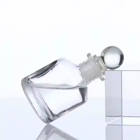 50ml vente en gros diffuseur de parfum transparent bouteille ronde en verre de parfum d'arôme avec bouchon en verre ou en caoutchouc