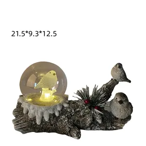 تحف MGO المزخرفة لديكورات الكريسماس تشبه الطيور مع كرة الثلج للبيع