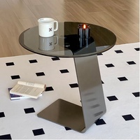 Canapé d'angle moderne italien minimaliste et circulaire Selle en cuir Bord en acier inoxydable Designer Balcon Petite table basse